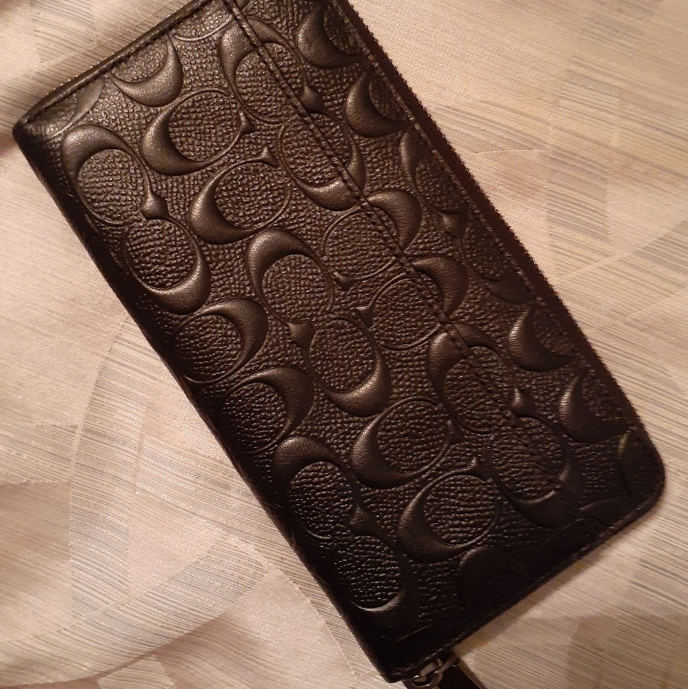 Black leather men's Coach zip around wallet